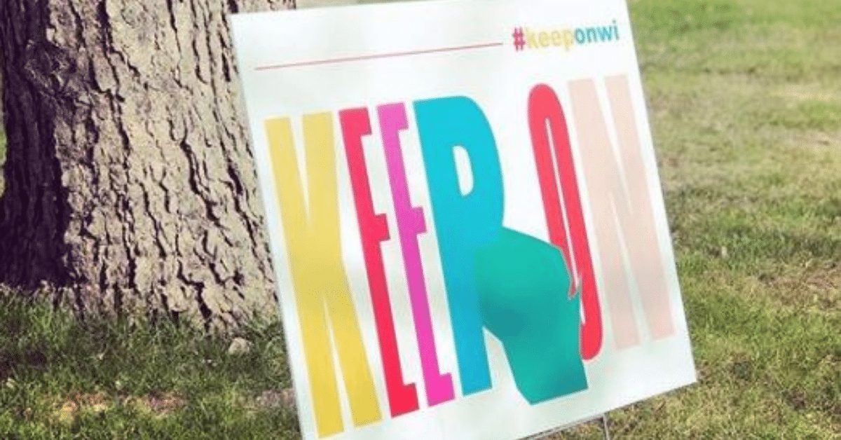 Sign in front yard that says "Keep On #keeponwi"