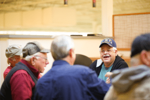veterans gathered at a table